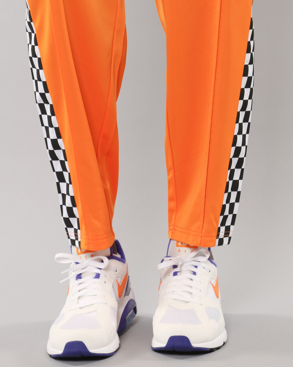 PLEASURES Checkered Track Pants - Orange