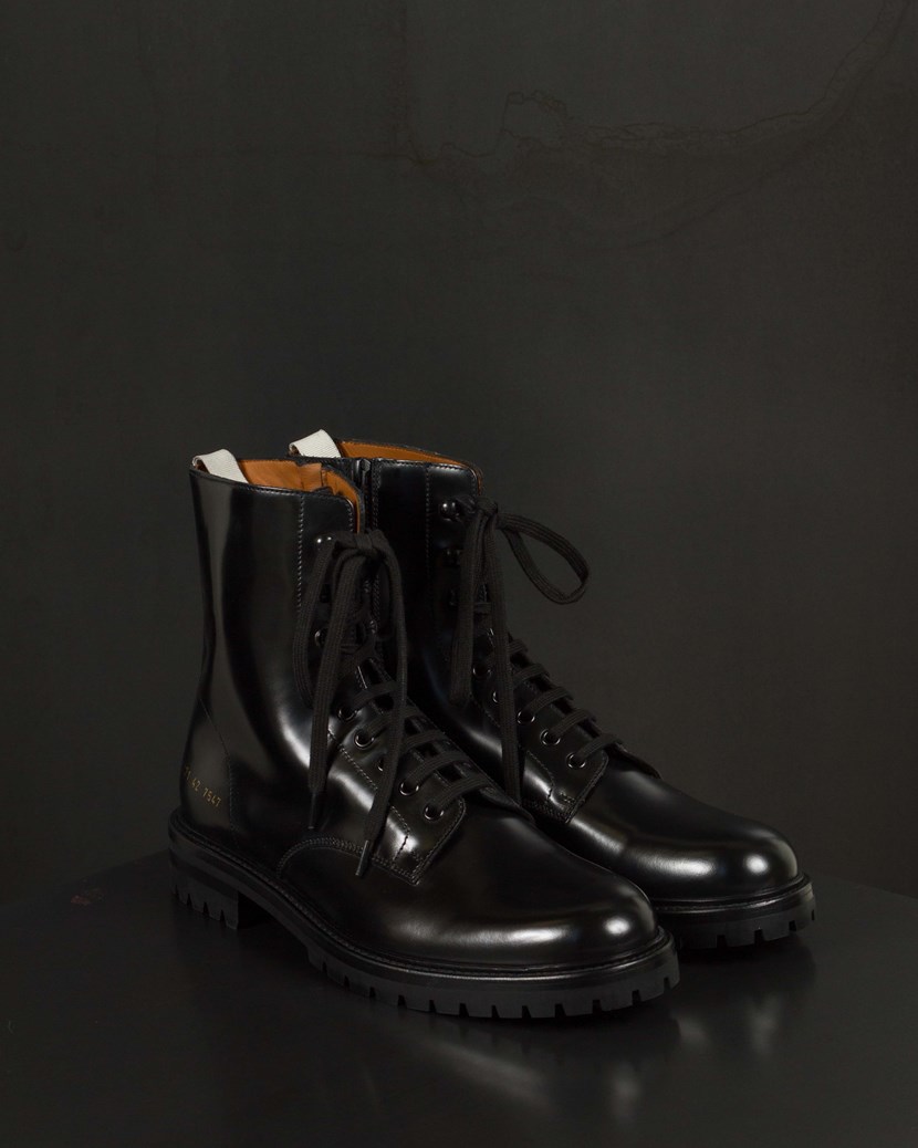woman by common projects combat boots